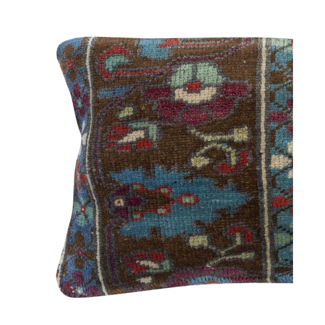 Add a touch of history and warmth to your space with this vintage handmade Turkish wool rug cushion cover. Crafted from...