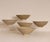 5 Chinese Song Dynasty Celadon Bowls from the Jepara Wreck. The bowls have a sculpted rim and are swiftly Incised with an...