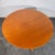 This drop leaf dining table is a versatile and practical example of British mid-century furniture design from the 1960s....