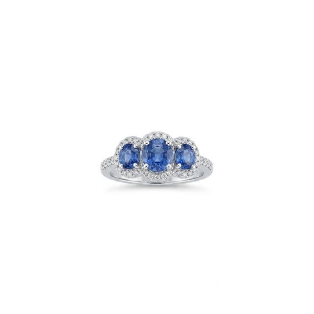 Stunning 18k Gold Sapphire and Diamond Halo Cocktail Ring, New Design. Beautiful piece in excellent condition.