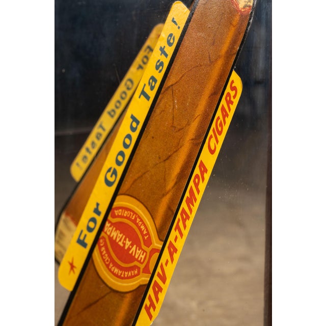 This display case for Hav-A-Tampa Cigars is in remarkable condition with wonderful artwork on the single-pane glass sides....