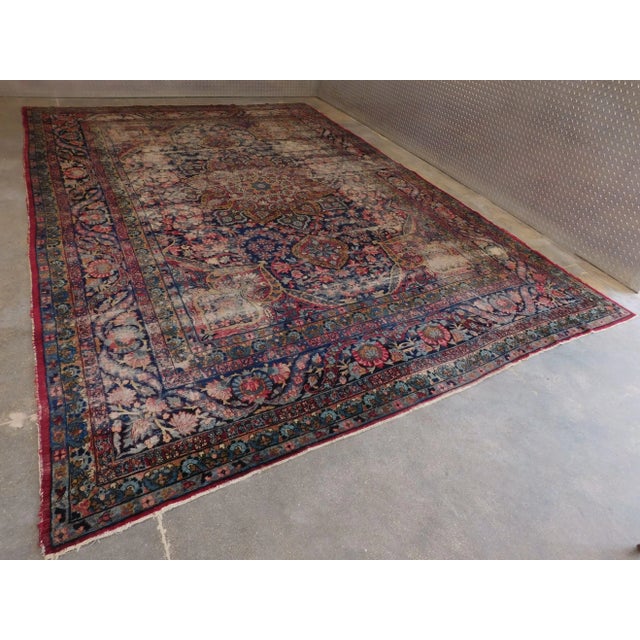Distressed antique Persian rug. Circa 1900. Wool pile on cotton foundation. A rare find. 9'x 13'