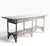 Unusually large split reed wicker console table in later white paint finish. The table is structurally sound and sturdy,...