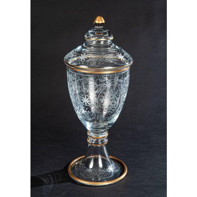 A timeless expression of Italian artistry, this elegant crystal urn features intricate hand-etched floral and geometric...