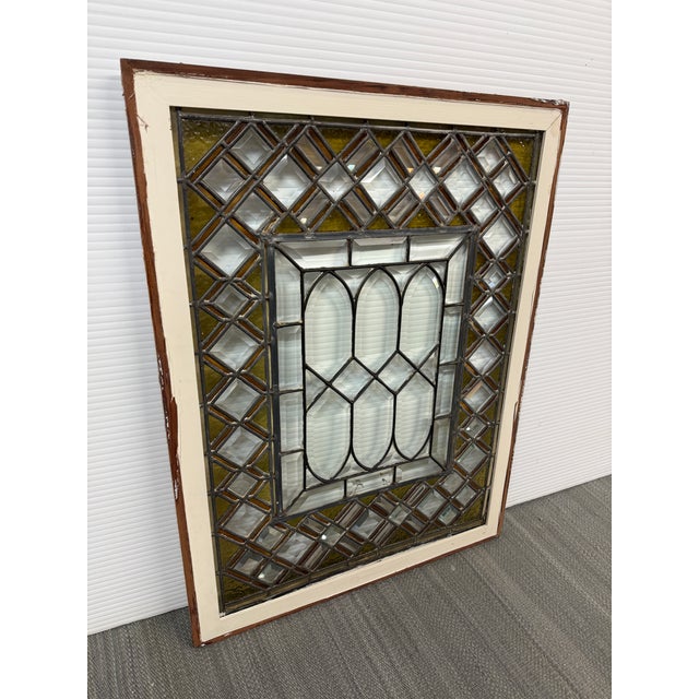 Design Plus Gallery presents an Antique Beveled Stained Glass Window. This window was salvaged from its original home from...