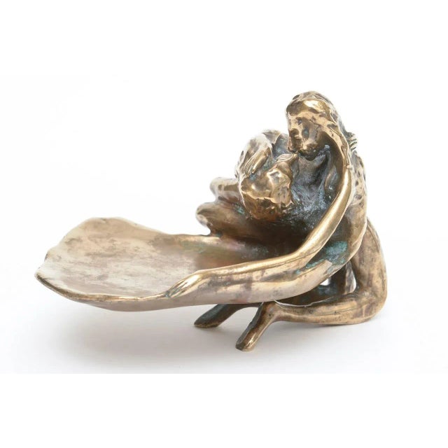 This small but amazing sensual bronze sculpture by Victor Zaikine is wonderful from every angle. The lovers embrace...