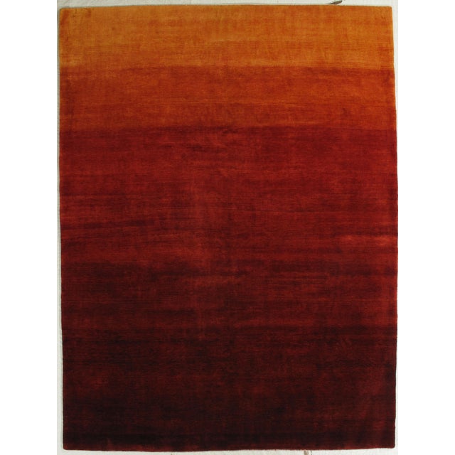 Vintage hand-knotted Gabbeh style rug with a tonal field and subtle gradient effect. Woven in wool with a simple, open...