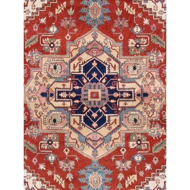 The Pasargad Home Serapi Collection offers traditional rugs crafted with exceptional attention to detail. Each rug is...