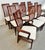 This listing is for a set of twelve Vintage Danish Modern Rosewood Dining Chairs. Featuring a wavy spindle back design,...