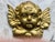 This solid brass robe hook has a putti as the design Width 4.5 Height 5.5 Depth 2