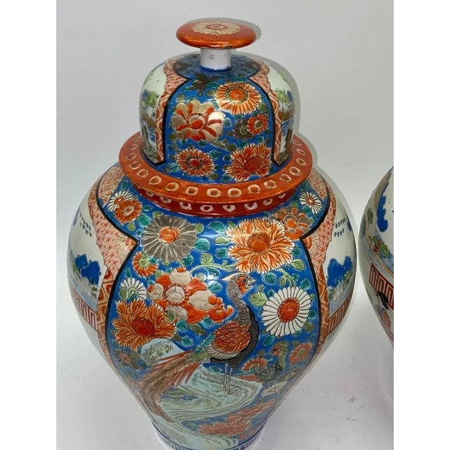 A large and very fine condition pair of antique Japanese Imari Ginger jars from the second half of the 19th century. Each...