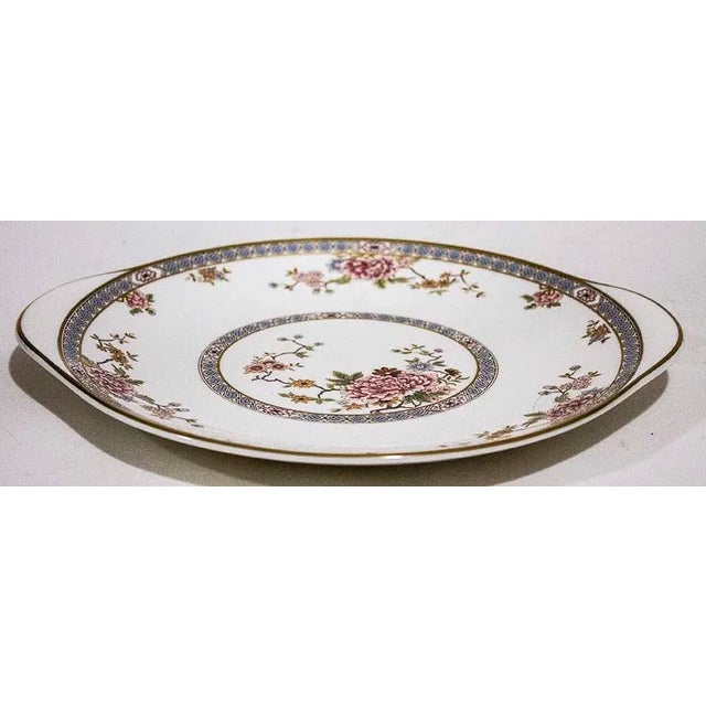 Royal Doulton handled cake plate in the Canton pattern. The Canton pattern was manufactured for 18 years from 1978 - 1996...
