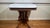 Victorian Marble-Top Parlor Table with Carved Walnut Base This table is a Victorian-era marble-top parlor table, most...