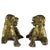 A pair of gilded bronze lions, Nuremberg, circa 1500, probably originally used as the legs of a coin cabinet or cabinet...