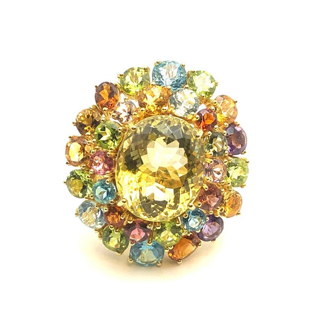 Bochic “Orient” Amethyst, Lemon Quartz, Citrine & Blue Topaz Cocktail Ring in 18K Gold & Silver A striking and highly...
