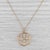This lovely Tiffany & Co necklace is titled Garden Flower and featues fine cable chain from which a pendant of a delicate...