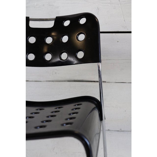 These three chairs were designed in 1970 by Rodney Kinsman for Bieffeplast. They were made of curved steel rod and...