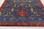 This 8x10 contemporary rug showcases an elegant floral design, hand-knotted in luminous natural silk. A rich sapphire-blue...