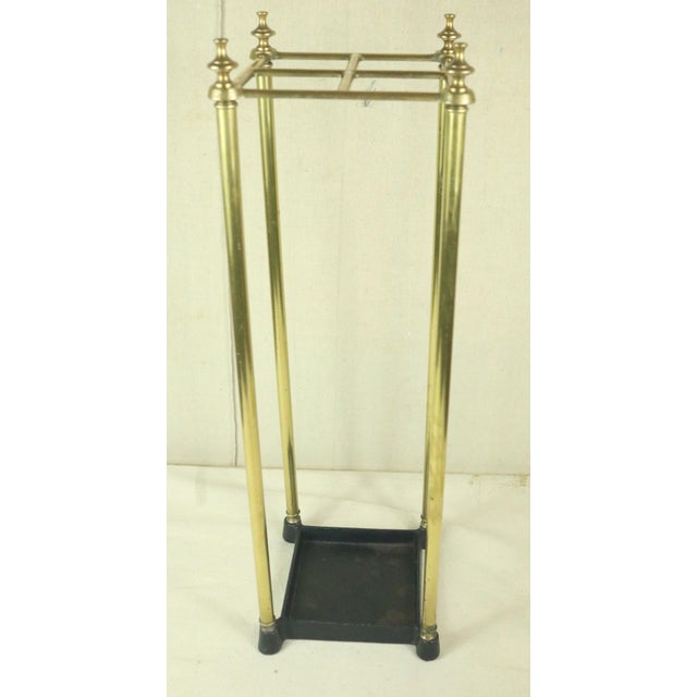 A French umbrella of cane stand dating from the Napoleon III period, circa 1870. The frame is made of brass while the base...