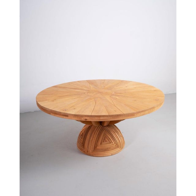 Rosa dei Venti round table in pinewood designed by Mario Ceroli for Poltronova in the 1970s. This table is part of the...