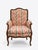 French Louis XV–Style Walnut Bergère Armchairs in Ikat Upholstery With Brass Nail Head Trim — 20th Century Matching Pair For Sale - Image 3 of 9