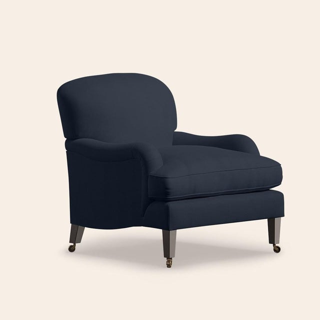 Designed in a classic silhouette, the Sofia chair's magnificent shape is complemented by an overstuffed seat cushion and...
