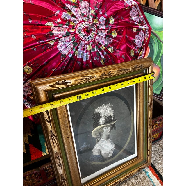 Up for consideration is a beautiful vintage black and white print of a woman in a fancy hat in a gold frame. This would...