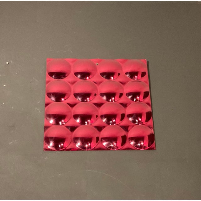 Vintage, Mid Century Modern cranberry in color, square mirrored plexiglass convex bubble mirror, circa 1970’s. This bubble...