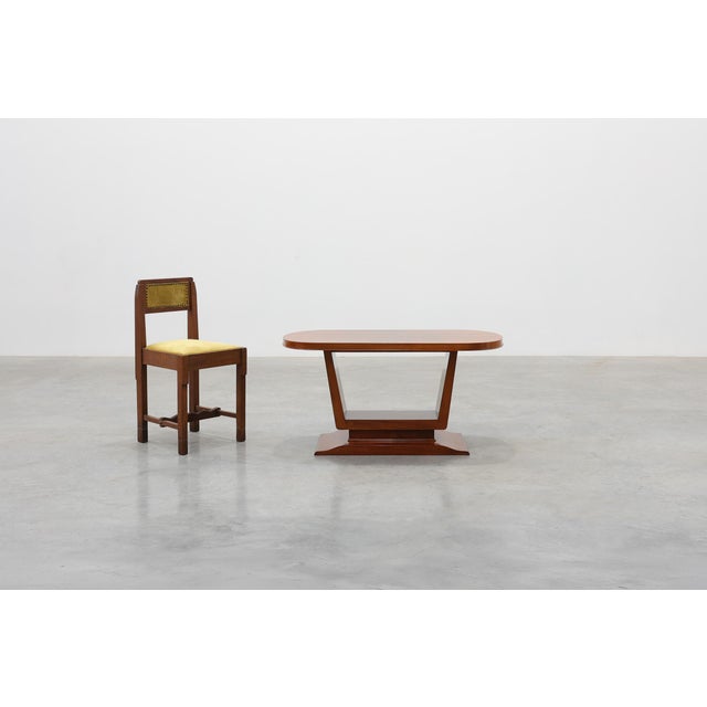 A striking Belgian Art Deco coffee table dating from the 1920s, distinguished by its elegant geometric form and...