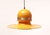 A 1970s metal pendant lamp in a yellow hue. There is no label. It takes a lightbulb. The lamp is in excellent condition...