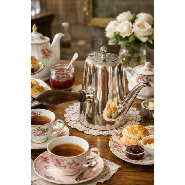 A beautifully crafted antique English silverplate chocolate pot / tea pot by Martin Hall & Co. of Sheffield, marked...