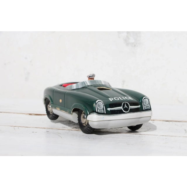 Circa: 1960. Material: Plastic and metal. Origin: Western Germany. Marked: Police, Mercedes-Benz (The Logo), 300 SL, Made...