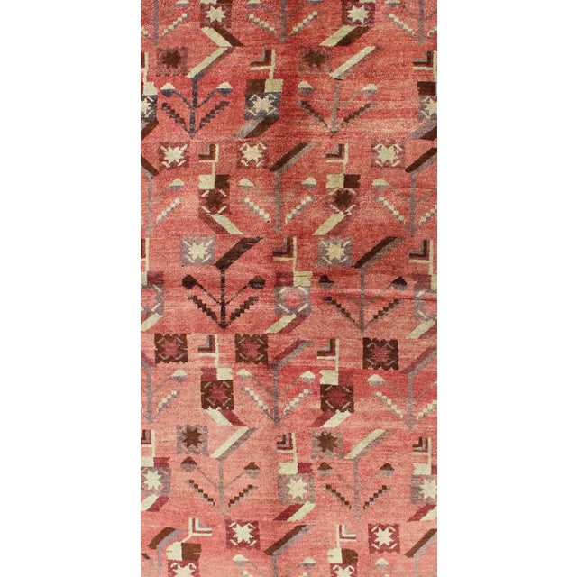 Tribal Turkish Oushak Vintage Carpet With Tribal Figures Set Soft Red Pink Background For Sale - Image 3 of 7