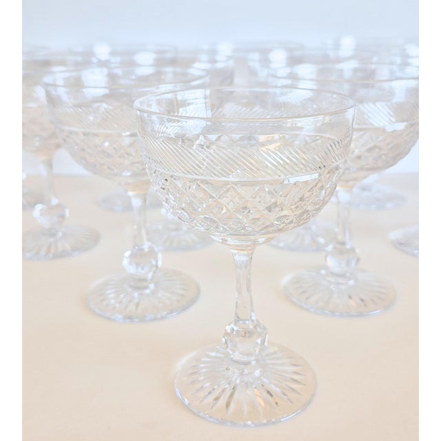 Vintage Tudor Crystal champagne coupes, made in England, set of 8. Beautiful set, very detailed, heavily cut, heavy in...