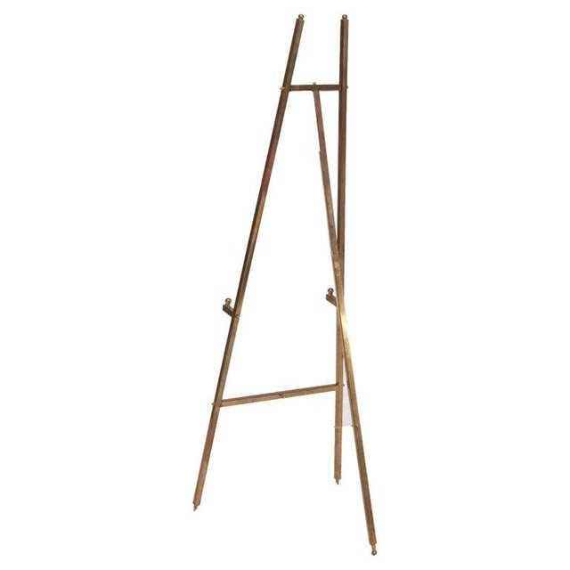 Pair Of Vintage Brass Art Display Easels 20thC Measure - 60 1/4" x 21" x 21" A pair of vintage brass easels from the 20th...