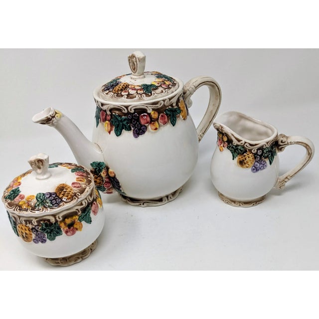 This ceramic sugar and creamer set would be perfect for anyone who appreciates the lovely look of vintage ceramic and its...
