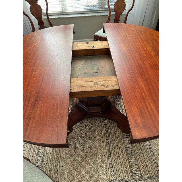 Beautiful solid cherry dining table plus 6 chairs and 2 captains chairs. Originally purchased for 1 of the Rothenberg...