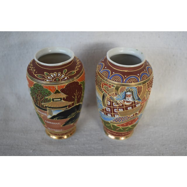 Two vintage Japanese Satsuma vases with applied marriage decorations. These are pre-owned items so please see all pictures...