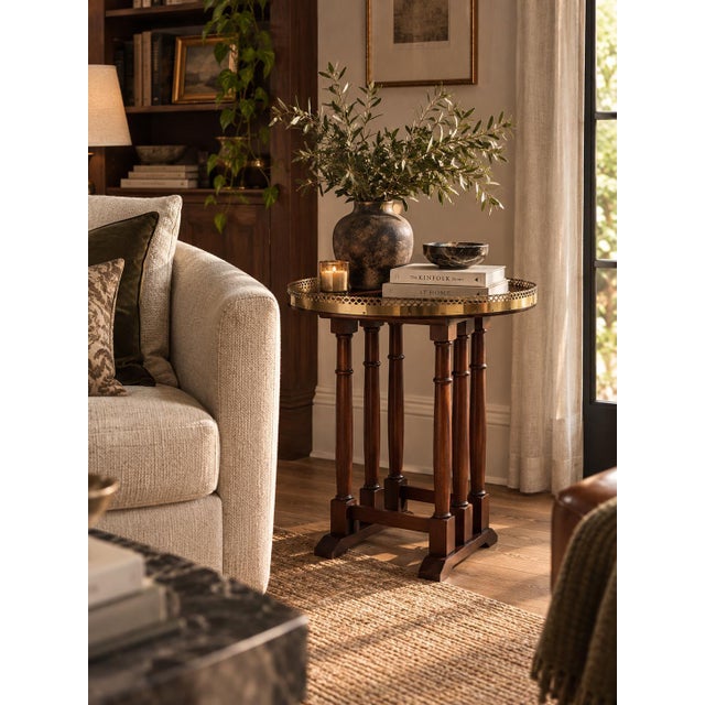 Elegant vintage oval side table by Hekman Furniture Co., crafted in richly finished mahogany with a beautiful matched-...