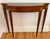 1990s Federal style inlaid mahogany console table on tall tapering legs. An 18th century design with quality construction...