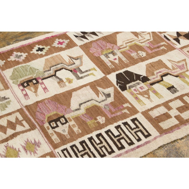 Handwoven in wool and originating circa 1950-1959, this 4x5 vintage Scandinavian kilim joins Rug & Kilim’s Scandinavian...