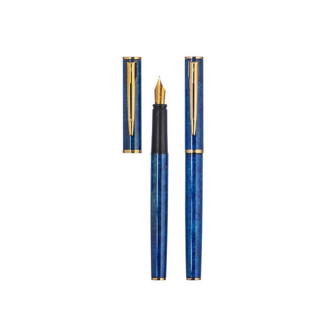 Case with a gold-plated F nib pen and a ballpoint pen, lacquered in blue with a marbled finish. France, 1990s. Dimensions:...