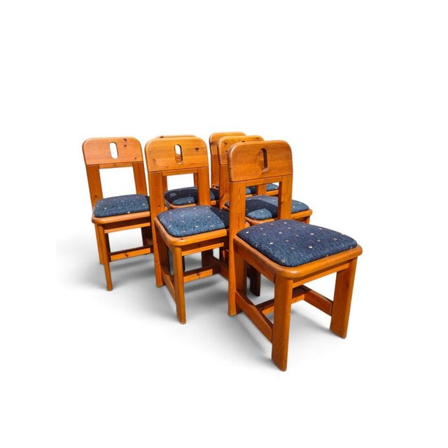 This set of six WASA dining chairs presents a robust expression of Scandinavian design principles. The chairs are...