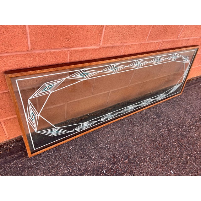 This is so beautiful! Very, very heavy made of oak, and double pane lead glass with metal and stained green glass inlay....