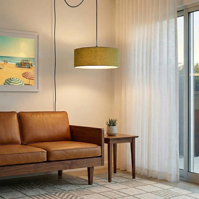 Crafted with weathered brass and a steel construction, the Stretch Swag Lamp is a modern swag kit designed by the NOVA...