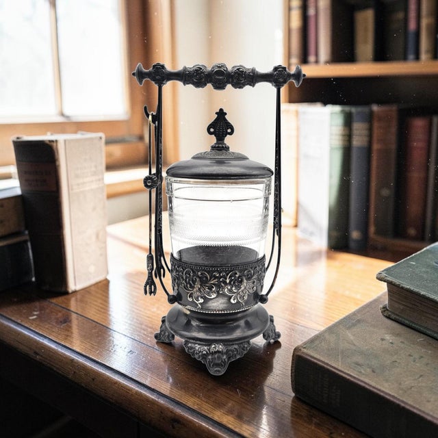 Beautiful Victorian-era pickle castor by Forbes Silver Co. (Model #259). This set features an ornate, quadruple-plated...