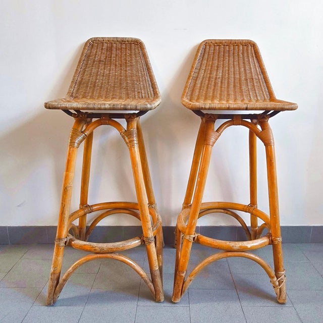 Fair condition. The stools are very sturdy and comfortable but have several imperfections and signs of wear; the leg ties...