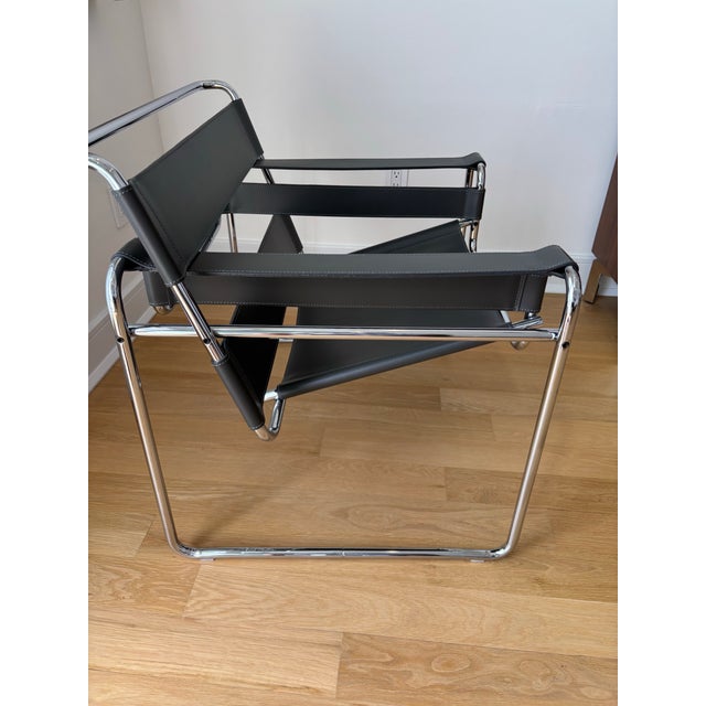 Iconic Wassily lounge chair designed by Marcel Breuer for Knoll Studio, purchased directly from Design Within Reach. This...
