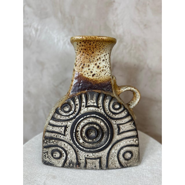 A beautiful and imposing German ceramic jug dating from the 1960s. It is distinguished by its sculptural silhouette, side...