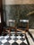 This pair of dining chairs was produced by Dyrlund in Denmark in the 1960s. The chairs feature teak frames with gently...